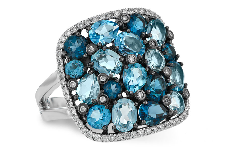 E242-50304: LDS RG 3.67 BLUE TOPAZ 3.94 TGW