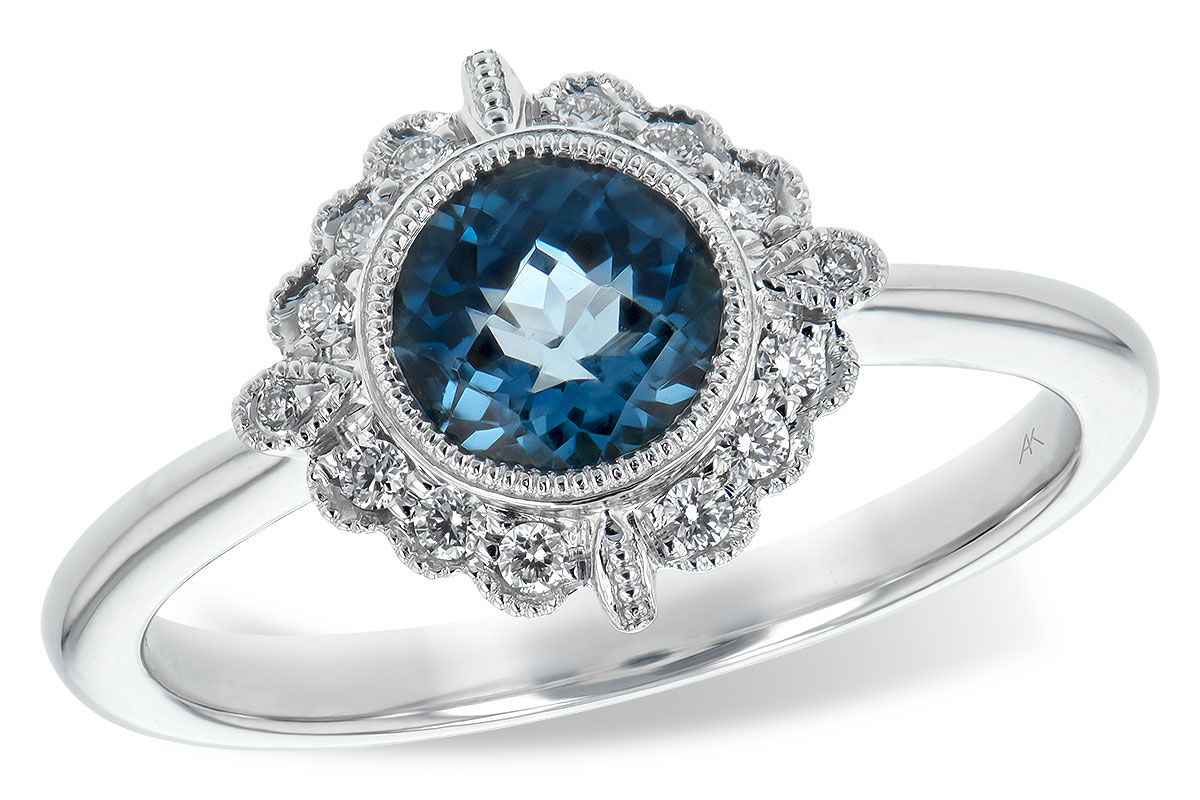 K244-28485: LDS RG .93 BLUE TOPAZ 1.05 TGW